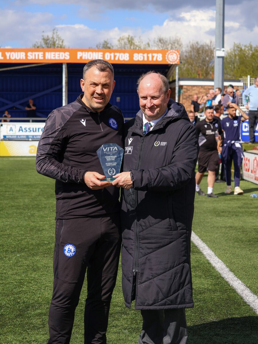 Danny Scopes receiving the Vita Risk Solutions Isthmian Premier Manager of the Month trophy for March 2026